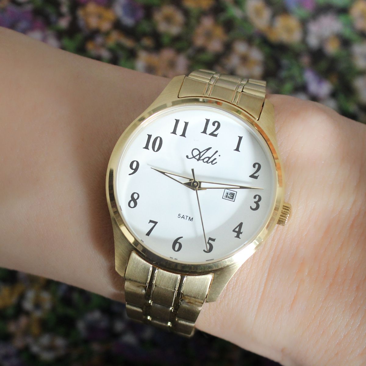 שעון יד ADI מוזהב עם תאריכון לאישה